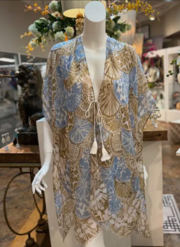 A woman 's dress is displayed in the store.